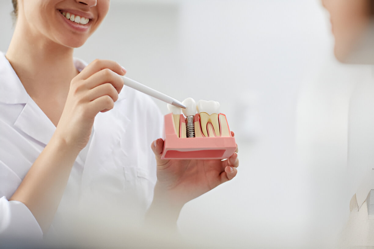 Why does my dental implant hurt when I chew?